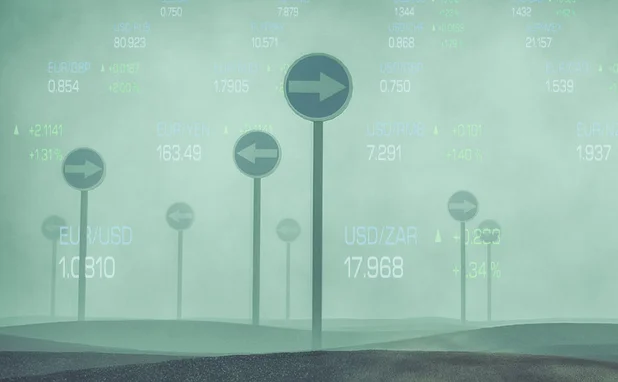 Conflicting signs in a foggy landscape