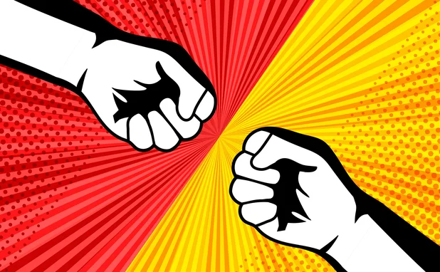 two hands punch towards each other
