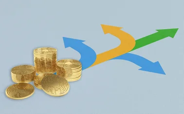 Some digital coins are seen at the start of some diverging direction arrows