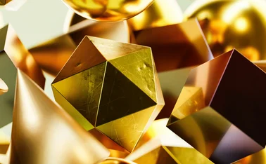 Gold and copper metallic 3D shapes suspended mid-air