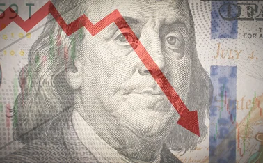 A dollar note with a downward pointing arrow overlaid