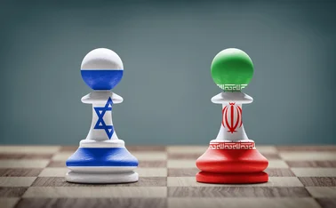 Israel and Iran chess pieces in confrontation