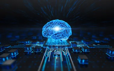 An image of a glowing digitised brain on a computer motherboard