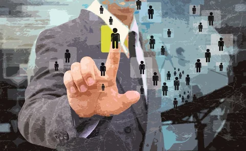 Man with finger on icon of person