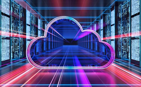 A cloud icon in between racks of servers in data centre 