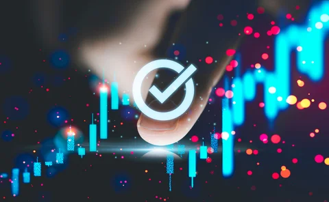 Finger approves a tick mark on a trading chart