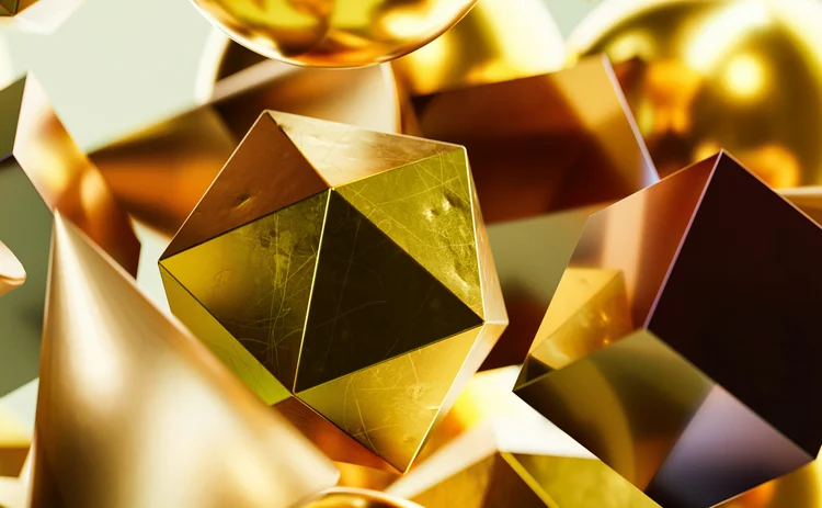 Gold and copper metallic 3D shapes suspended mid-air