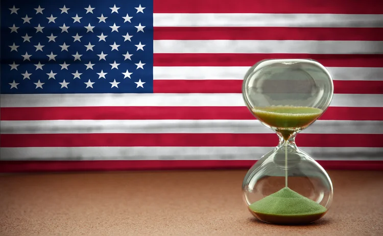 Tariff countdown US flag with an hourglass representing a countdown