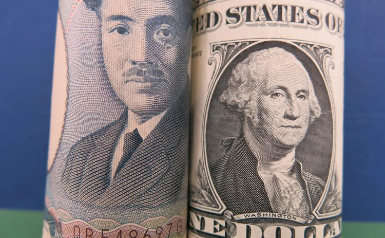 Dollar and yen banknotes