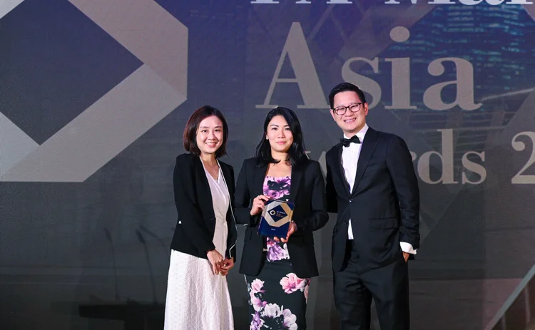 Winners collecting their trophies on stage at the FX Markets Asia Awards 2025