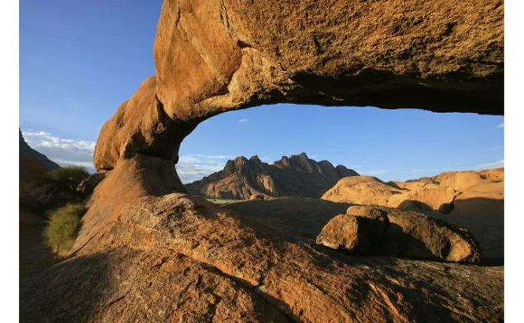 namibia-red-natural-granite-arch-in-desert-against-blue-sky namibia-red-natural-granite-arch-in-desert-against-blue-sky