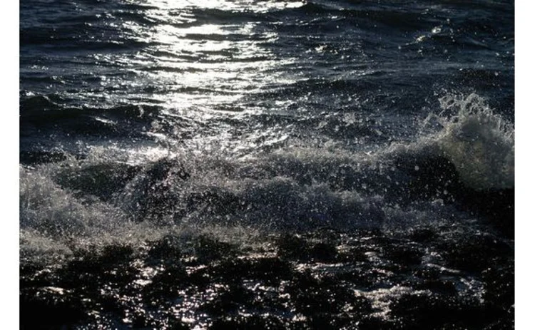 sea-dark-water-with-light-shining-on-waves
