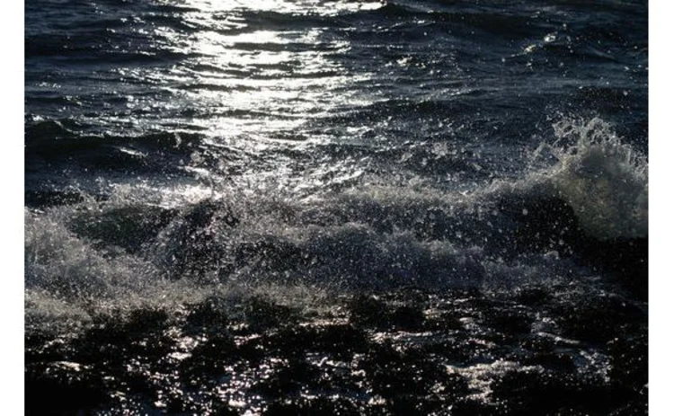 sea-dark-water-with-light-shining-on-waves sea-dark-water-with-light-shining-on-waves