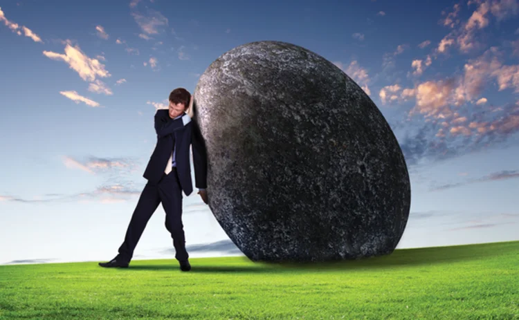 man-pushing-rock man-pushing-rock
