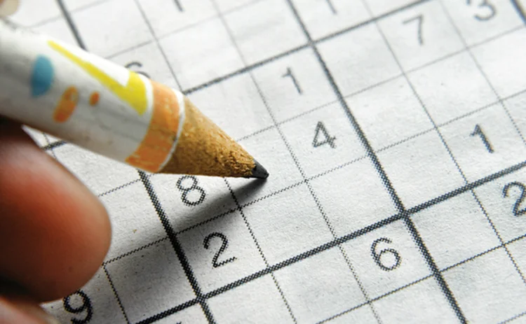Solving a sudoku puzzle with a pencil
