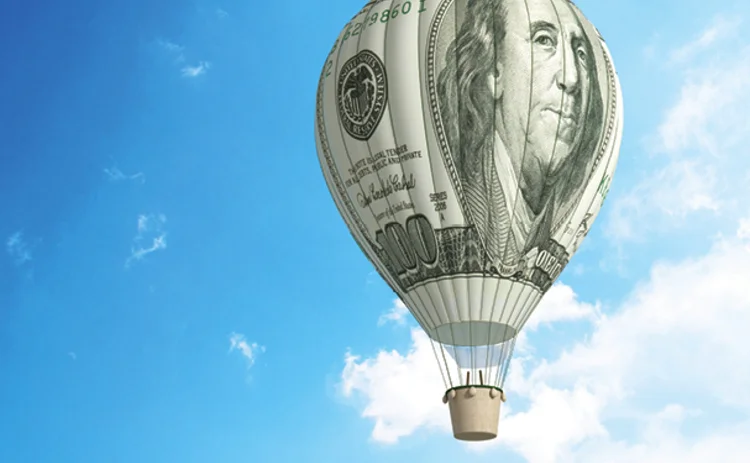 Image of a hot air balloon made of a 100 dollar bill