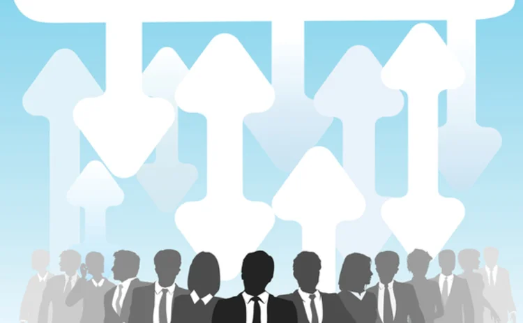 Silhouettes of businesspeople below a cloud connected by arrows