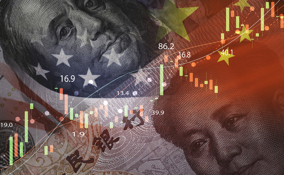 US and Chinese flags with dollar and yuan banknotes, overlaid with stock market graph 