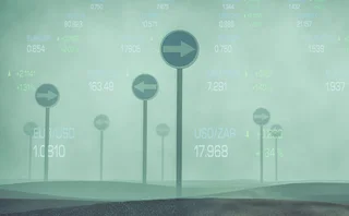 Conflicting signs in a foggy landscape