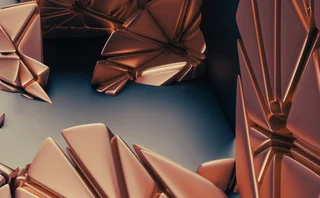 Abstract metallic copper geometric forms arranged around a dark central opening