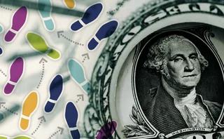 A dollar bill has some dance move foot placements superimposed over it