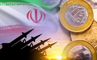 Montage of Iran flag with rocket launchers pointed at EM currencies