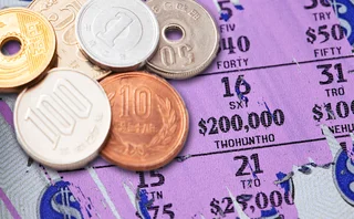 Yen coins on lottery scratchcard