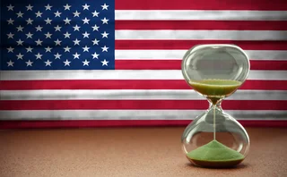 US flag with an hourglass representing a countdown