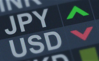 Close-up of exchange rate display showing JPY up, USD down