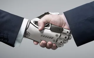 Human shaking hands with a robot