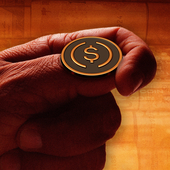 Hand flipping a USDC coin